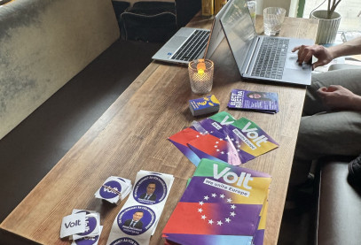 Campaign materials, including flyers reading 