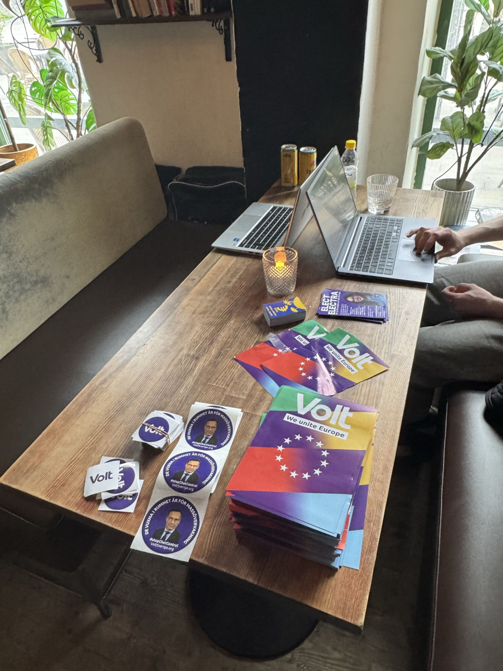 Campaign materials, including flyers reading 