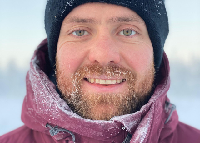 Portrait of Moritz Lang with snow in the background