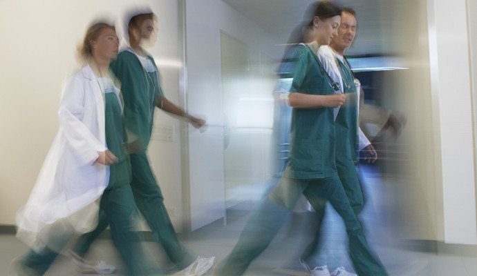 Stock photo of health staff walking in a hospital