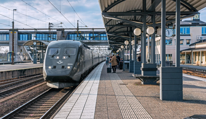 Stock photo of a train station and SJ train