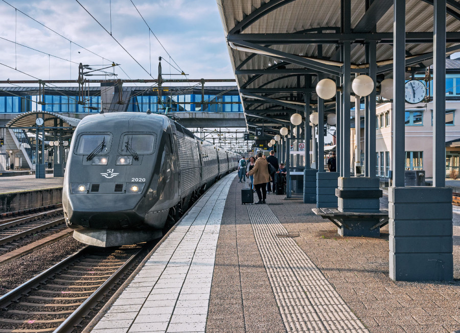 Stock photo of a train station and SJ train