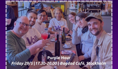 Seven people at restaurant table with text 